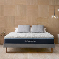 Front view of the Novaform Serafina Pearl Foam Mattress complete with gray and white pillows