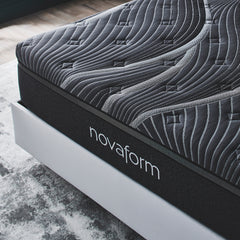 Angled front view of the luxury mattress to show the wave patterned plush cover with cooling fibers 
